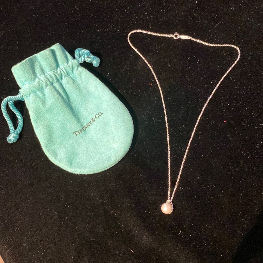 TIFFANY & CO Pearl and Diamond necklace on white gold chain.
